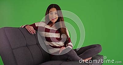 Cute Latina Female Lounging On Couch Smiling At Camera On Green Screen Stock Video Video Of