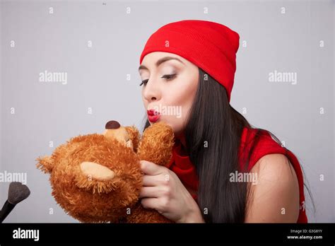 Brunette With A Teddy Bear Stock Photo Alamy