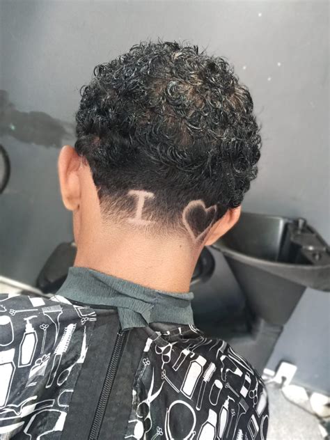 Guy haircuts with designs are the boldest trend in modern barbering 13