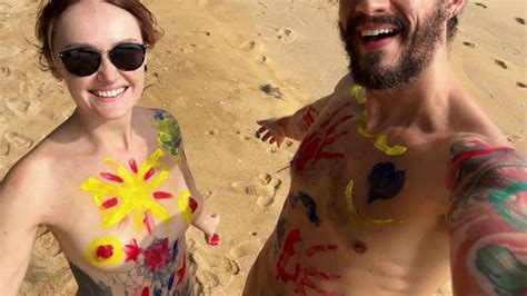 NAKED BODY PAINTING ON PUBLIC BEACH Wet And Massy Video With Painting Outdoor Naked Couple On