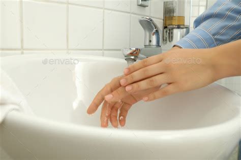 Woman Clean Hands In Wash Basin Close Up Stock Photo By AtlasComposer