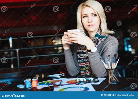 Blonde Girl Sitting In Cafe With Cup Of Tea Stock Photo Image Of Fashion Blond