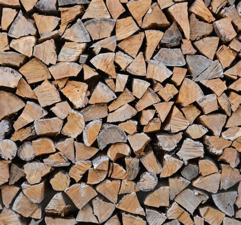 Premium Photo Close Up Stack Of Dry Firewood Oak Wooden Logs Chopped