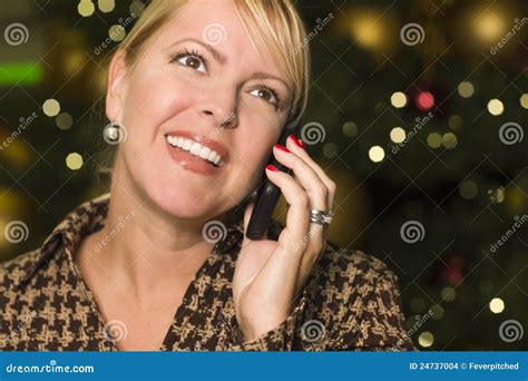 Blonde Woman On Her Cell Phone In The City Lights Stock Photo Image
