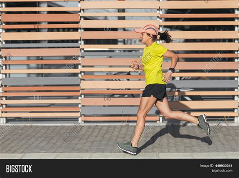 Latina Woman Running Image Photo Free Trial Bigstock