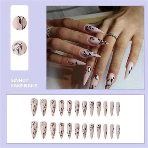 MARCH NAILS SPRING NAILS NUDE NAILS BLACK LEAVES DESIGN ALMOND NAILS LONG NAILS NAIL