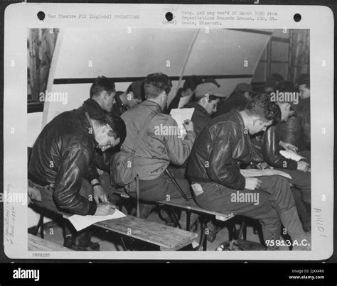 Members Of The 439Th Troop Carrier Group Taking Notes At A Briefing