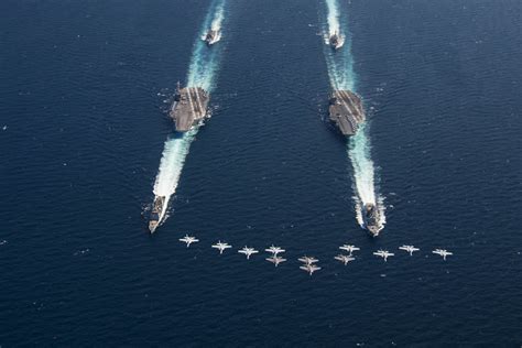 Aircraft from the Freedom Fighters of Carrier Air Wing 7 fly in ...