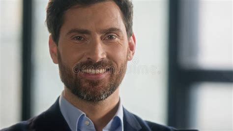 Close Up Caucasian Bearded Man Looking Side And Turning Gaze To Camera Smiling Successful Mature