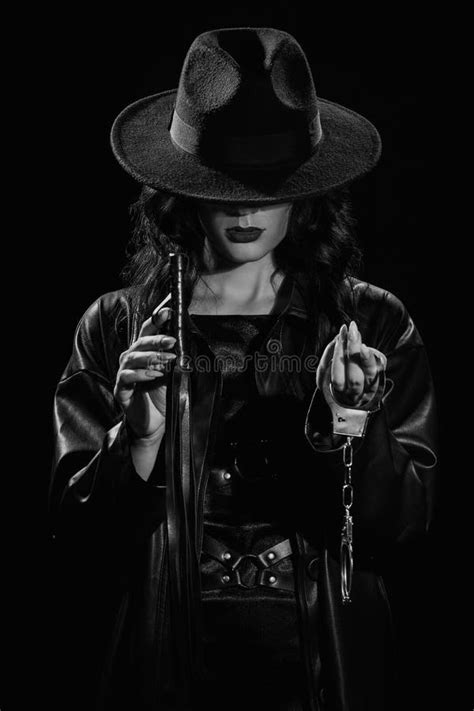 Female Dominant Mistress With A Whip Flogger And Handcuffs For BDSM Sex With Submission And