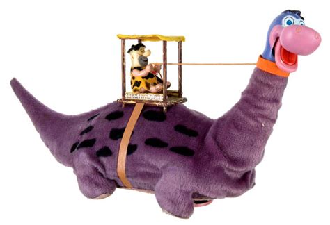 Hake's - "FRED FLINTSTONE ON DINO" BATTERY-OPERATED TOY BY MARX BOXED.