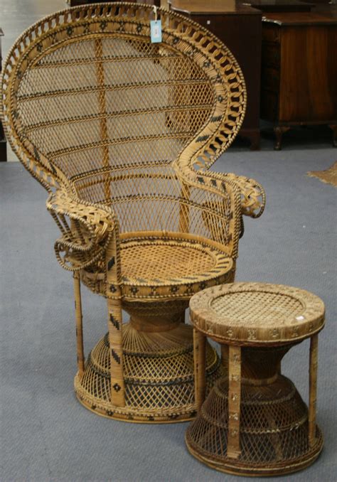 An Early Mid 20th Century Wicker Peacock Chair And Matching Stool