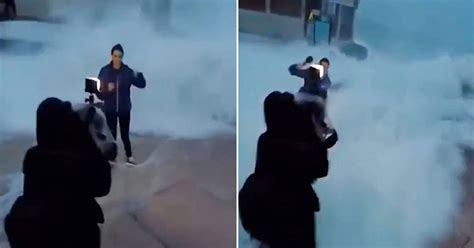 Watch Dramatic Moment News Reporter Is Swept Away By Freak Wave During