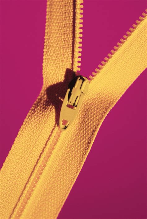 zipper fastening closure separating britannica