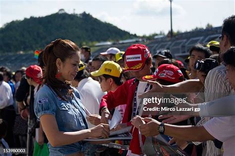 Asian Grid Girls Photos And Premium High Res Pictures Getty Images