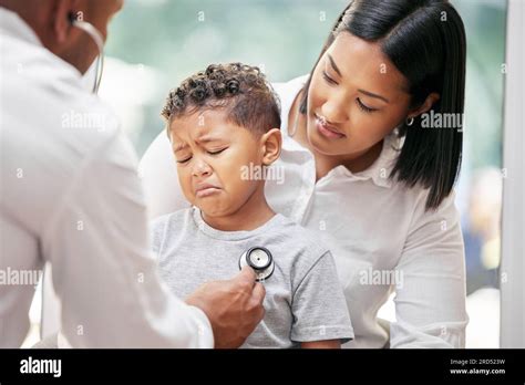 Mother Sick Child And Doctor With Stethoscope For Health Care In