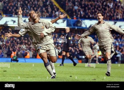 Barcelona's Ronaldinho (left) celebrates scoring his second goal Stock ...