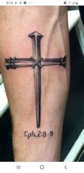 Three Nails Cross Tattoo