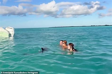 Anastasia Stassie Karanikolaou Rocks A Hot Pink Bikini And Swims With