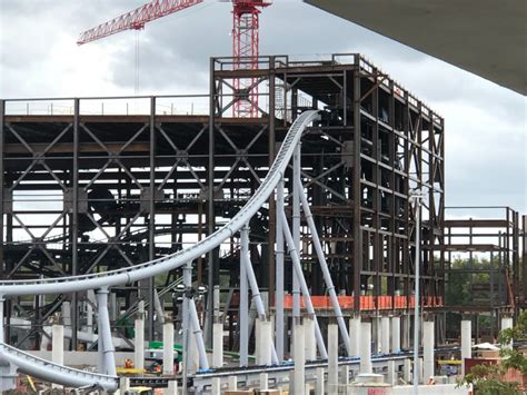Photos Final Piece Of Exterior Roller Coaster Track Installed On Tron