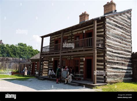 Reenactors Visit In Front Of The Hospital Building At Historic Old Fort