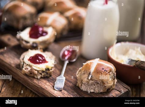 Creamy Tea Hot Cross Bun With Jam And Clotted Cream Stock Photo Alamy