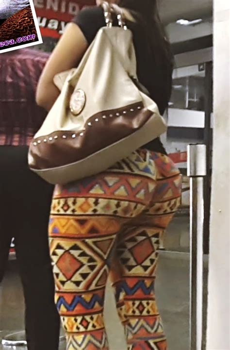 Beautiful MILF Brunette Shows Her Big Ass With A Very Tight Lycra