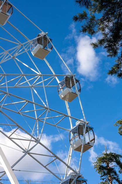 Premium Photo Empty Ferris Wheel Cabins Against The Sky