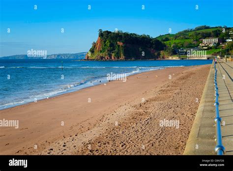 Teignmouth Beach With The Ness At Shaldon In The Background Stock Photo