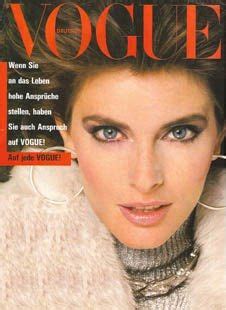 A Magazine Cover With An Image Of A Woman In Fur Coat And Hoop Earrings