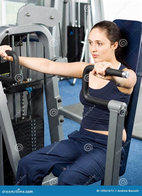 Young Woman Exercising In The Gym Stock Image Image Of Healthy