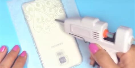 She Covers Her Phone In Wax Paper And Then Puts Hot Glue All Over It What She Makes Is