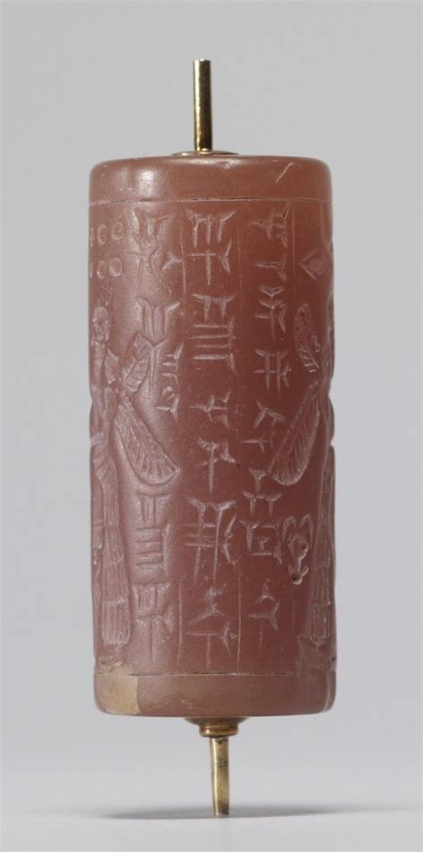 Cylinder Seal With Winged Deities Cylinder Seal Mesopotamia Ancient