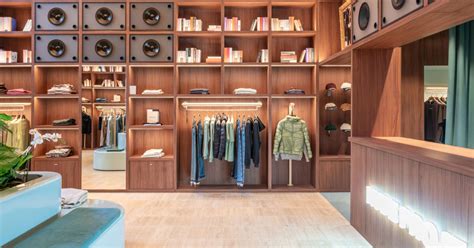 El Departamento Installs Massive Wooden Bookshelf For Nude Project S New Store In Barcelona