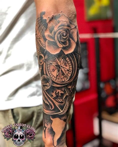 Tattoo de rosa bússola e âncora fechamento de antebraço Tatuagem