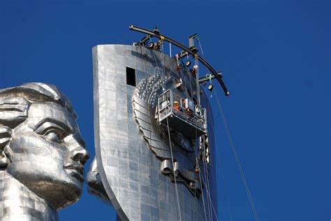 In Pictures Soviet Emblem Cut Off Ukraines Motherland Monument