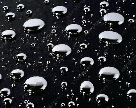 Mercury droplets - Stock Image - C001/9288 - Science Photo Library