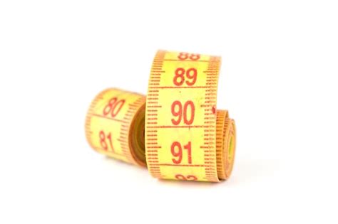 Premium Photo Yellow Flexible Porn Centimeter For Measurements On A