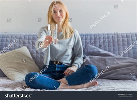 Pretty Blonde Woman Drinking Water Sitting Stock Photo Shutterstock