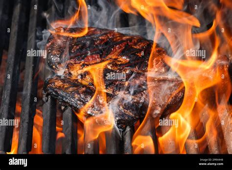 Searing And Smoking Ribeye Steaks On Grill Stock Photo Alamy