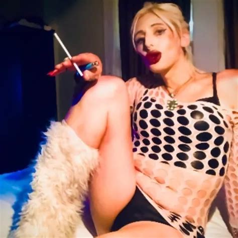 Sexy TS Smokes Luxurious 120 And Teases For The Camera Shemale Small Tits Porn Feat Zoe Marlow