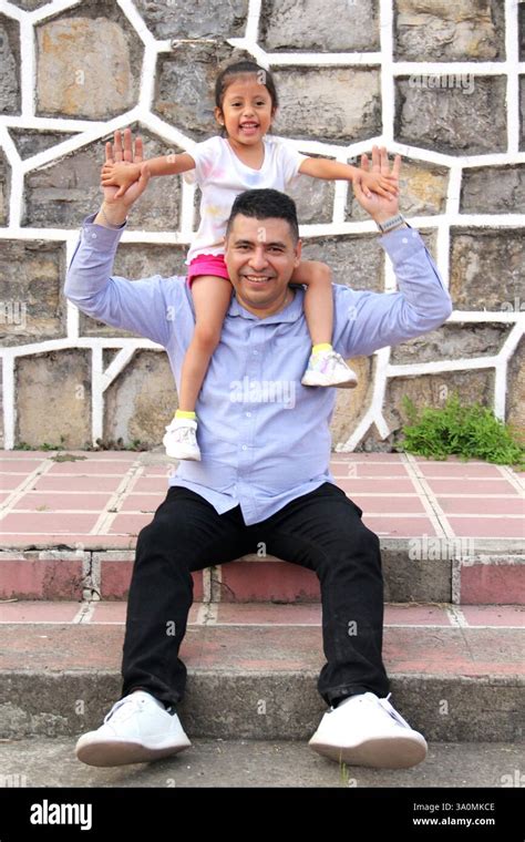 Divorced Dark Haired Single Dad Carries His Year Old Latina Daughter As Piggy Back Spends