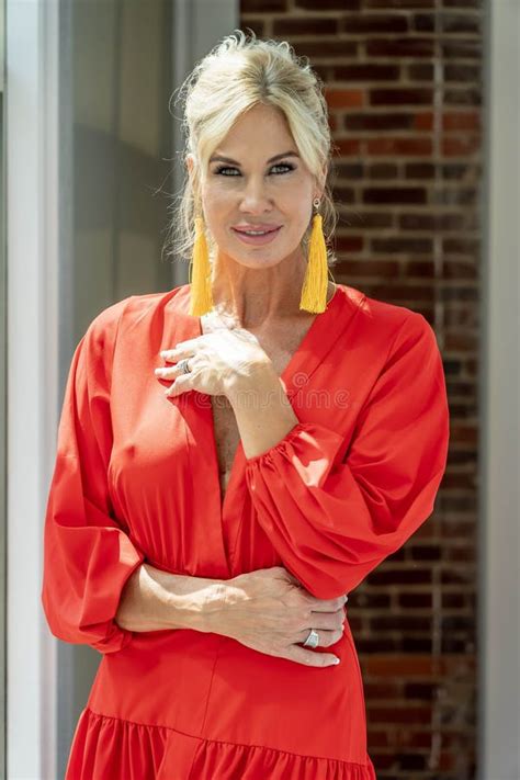 Exuding Elegance Blonde Beauty Radiates Confidence And Timeless Charm