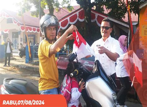 Diskominfo Pesisir Selatan Gelar Aksi Berbagi Bendera Merah Putih Di