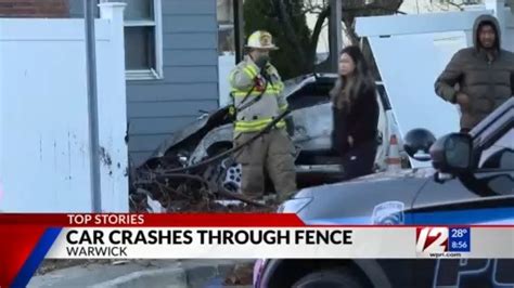 Car Crashes Through Fence In Warwick