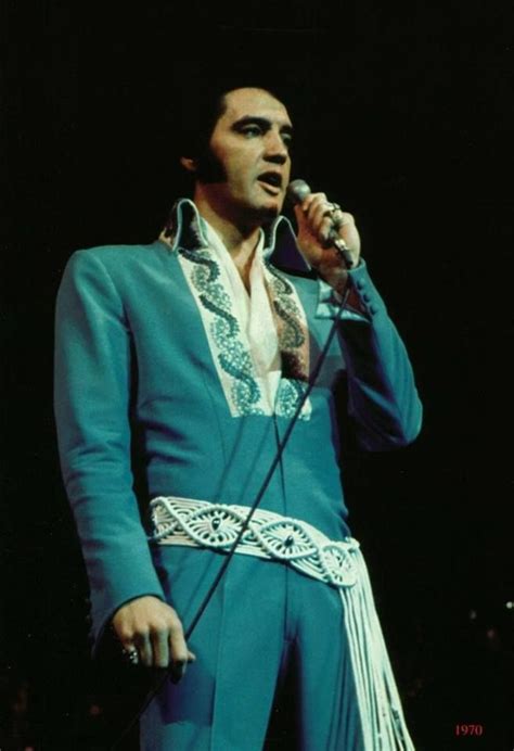 Like A Cobra Elvis Wearing The Blue Stapestry Aka Aqua Jumpsuit On Stage In Las Vegas It Is