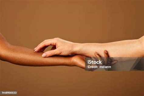 Cropped Picture Of A Multicultural Girls Touching Each Other Hands