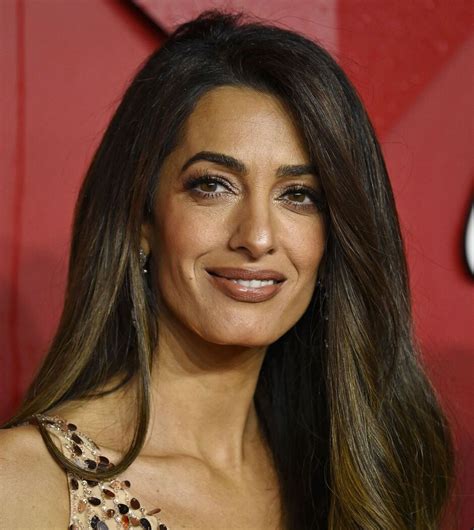 Amal Clooney looks ageless in show-stopping sequinned dress at Fashion