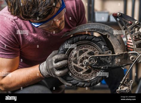 Repair Man Scooter Hi Res Stock Photography And Images Alamy