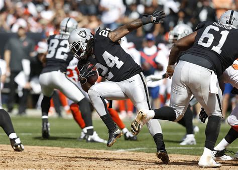 Oakland Raiders Running Back Marshawn Lynch 24 Runs Against The Cleveland Browns During An Nfl